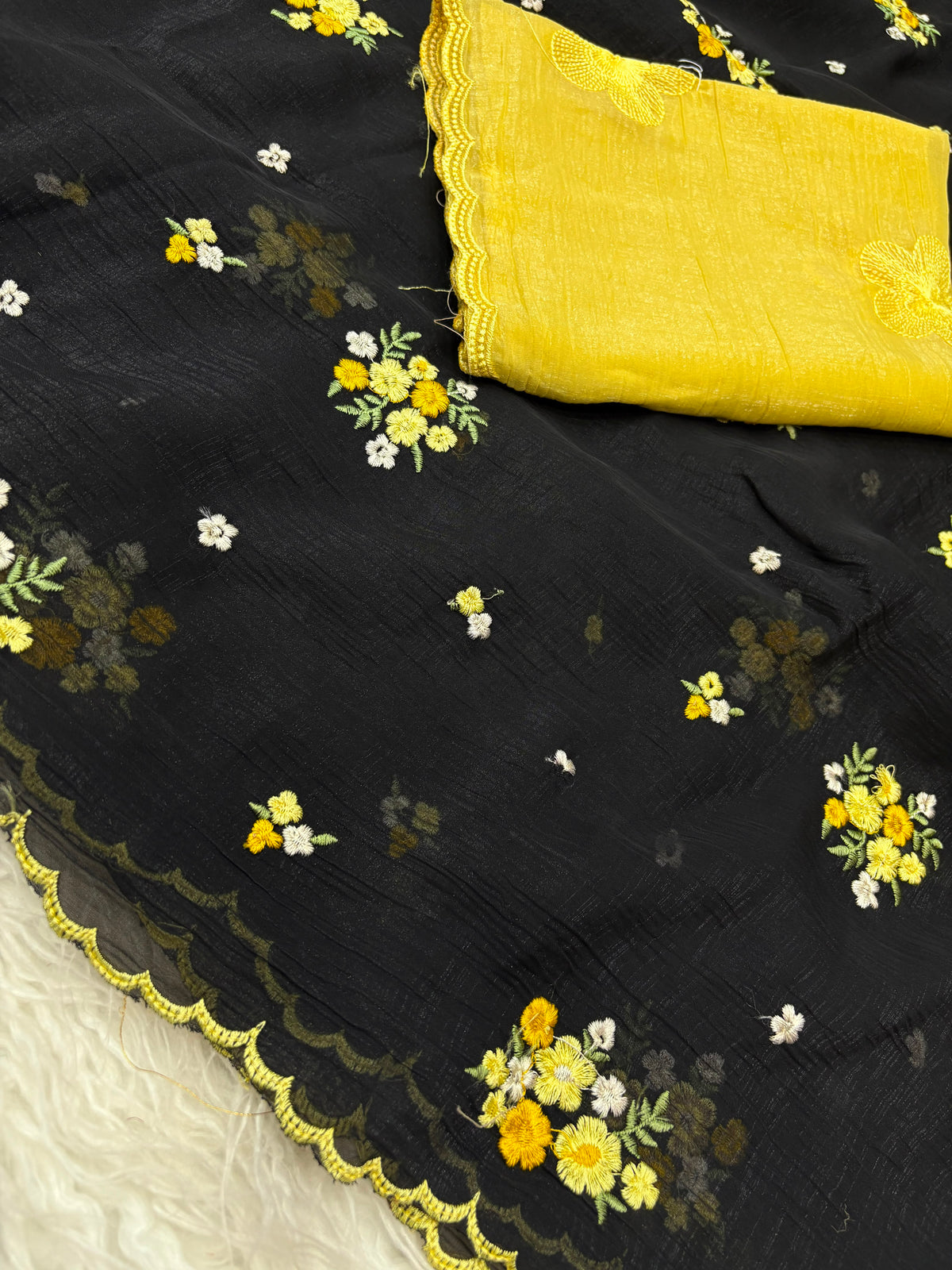 Crush organza embroidery work sarees with contrast blouse