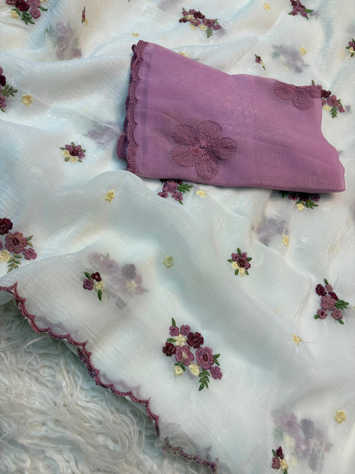 Crush organza embroidery work sarees with contrast blouse