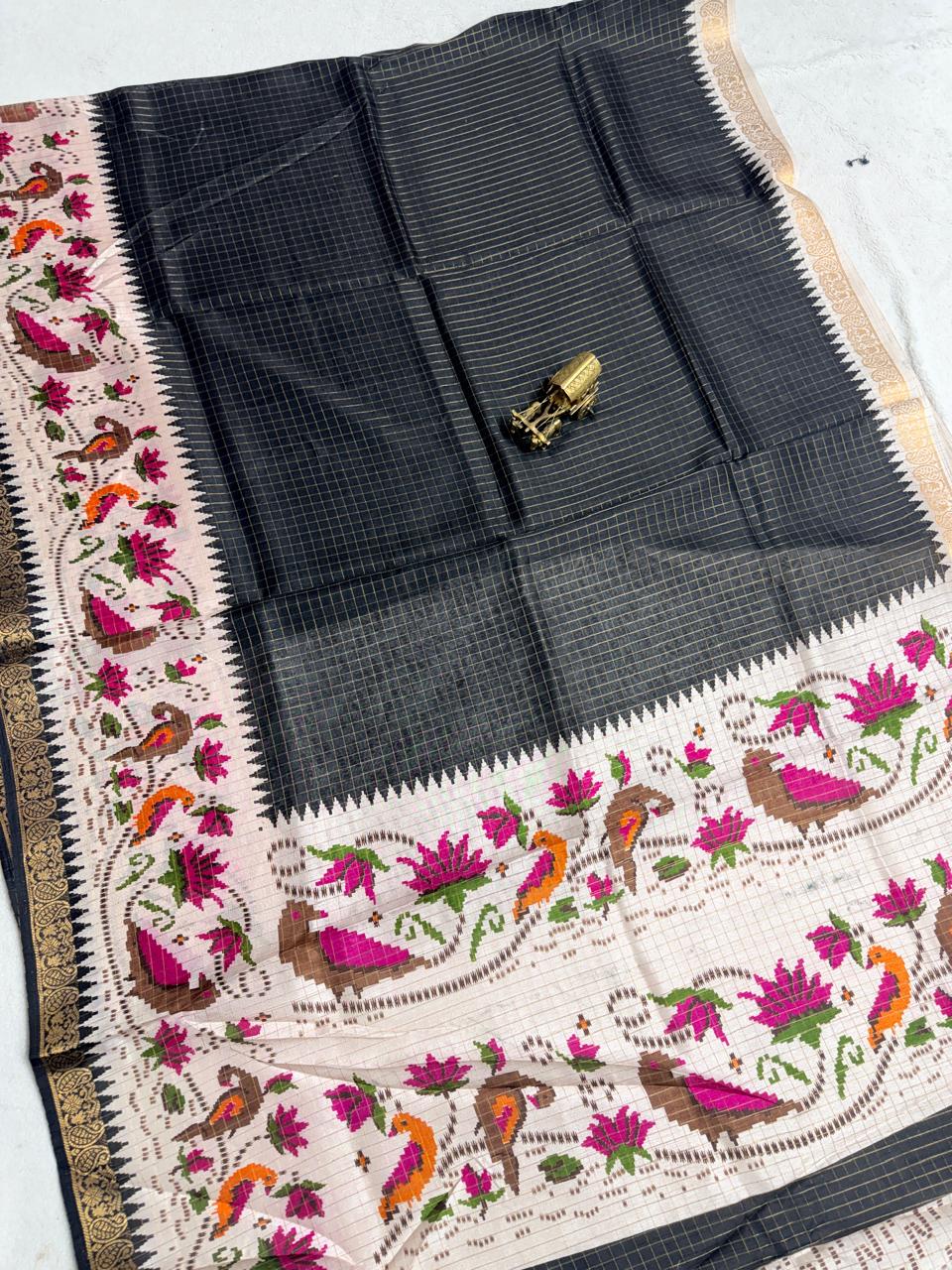 Crepe Silk with Patola design Saree.